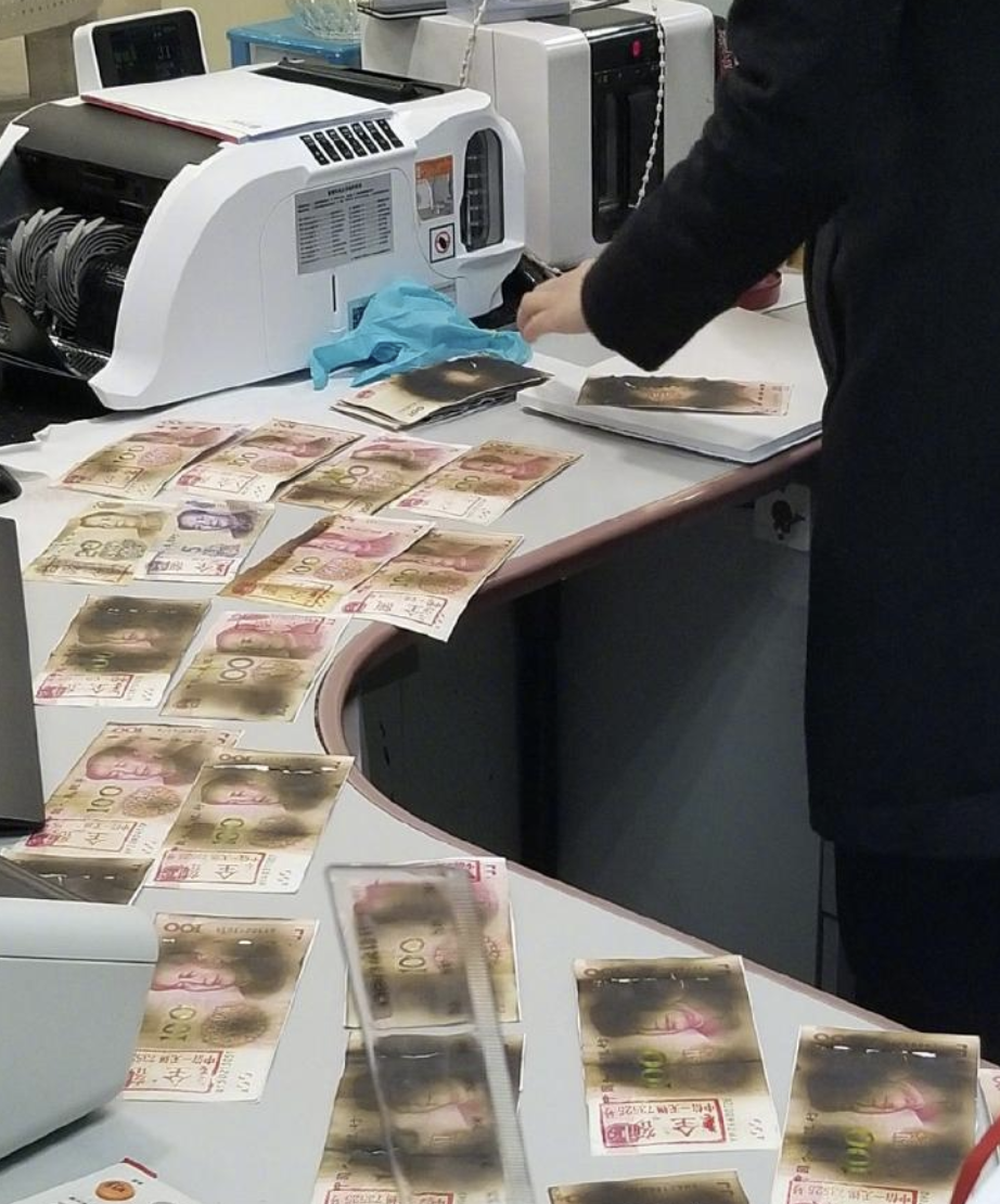 Woman puts around 3,000 renminbi in her microwave to kill virus Dimsum Daily