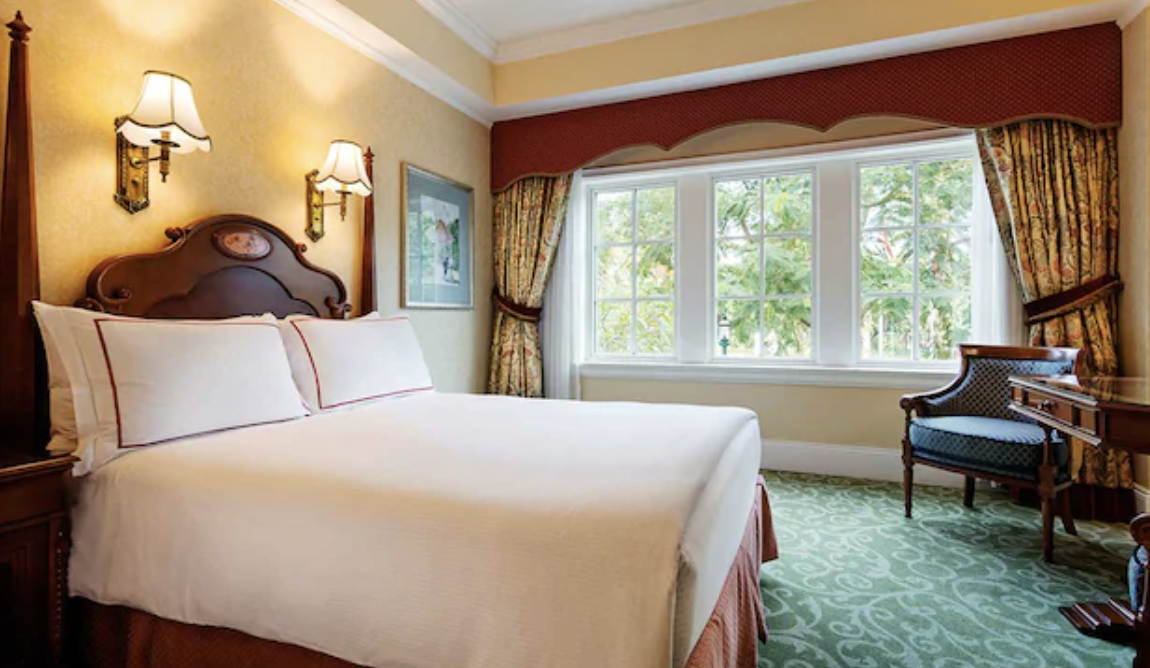 Stay in Deluxe room (fits family of 4) at Hong Kong Disneyland Hotel