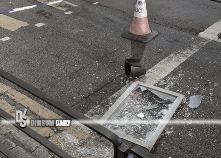 Window frame falls from tenement block in Kennedy Town and shatters on ...