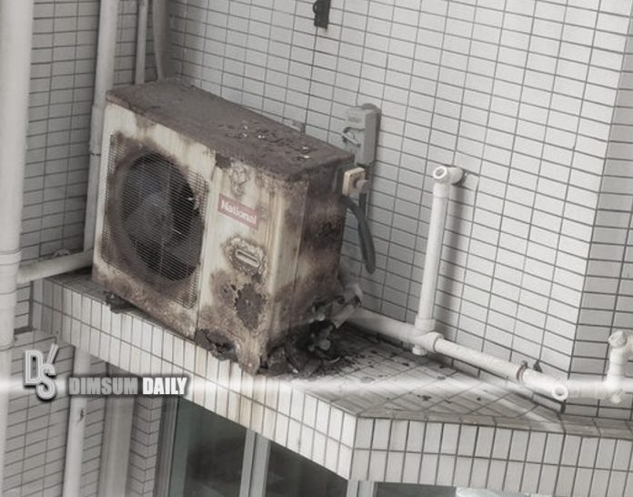 Rusty airconditioner compressor found installed precariously at Tseung