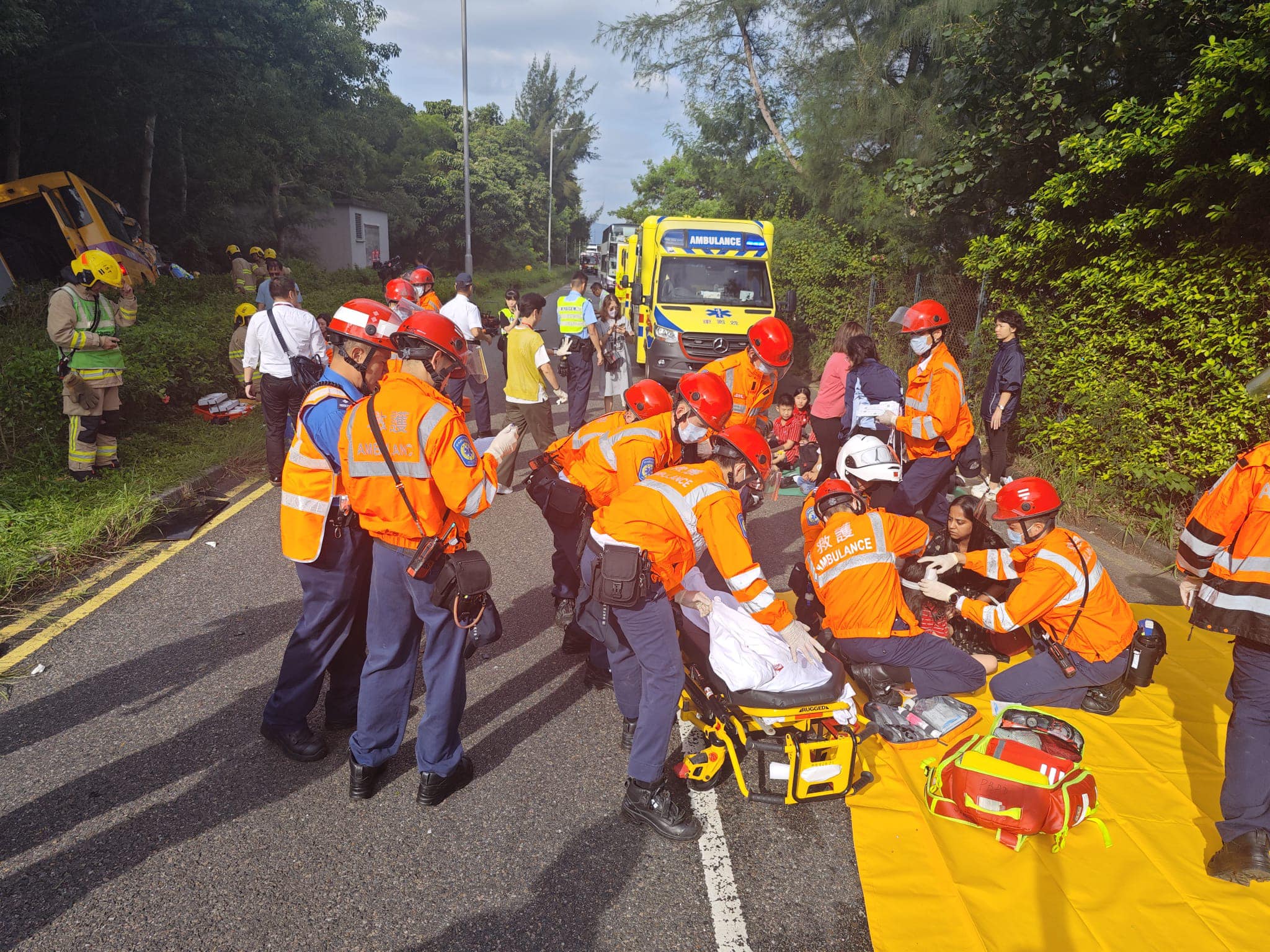 School bus collides head-on with Discovery Bay bus, driver trapped and ...