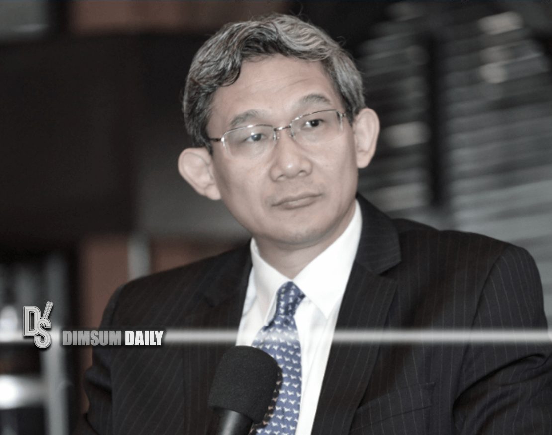 Nomura banker barred from leaving China as investigation into deal