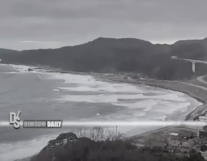 Hawaii tsunami warning downgraded
