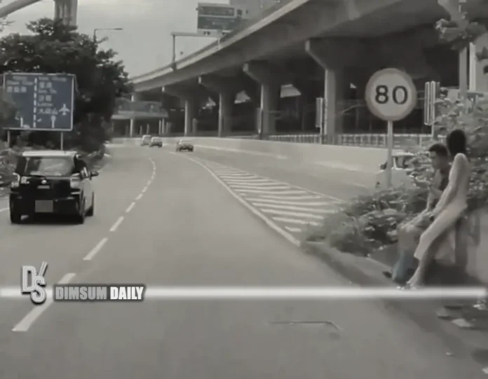 Lin Cheung Rd Couple spotted relaxing on highway bridge wall in Cheung Sha Wan ...