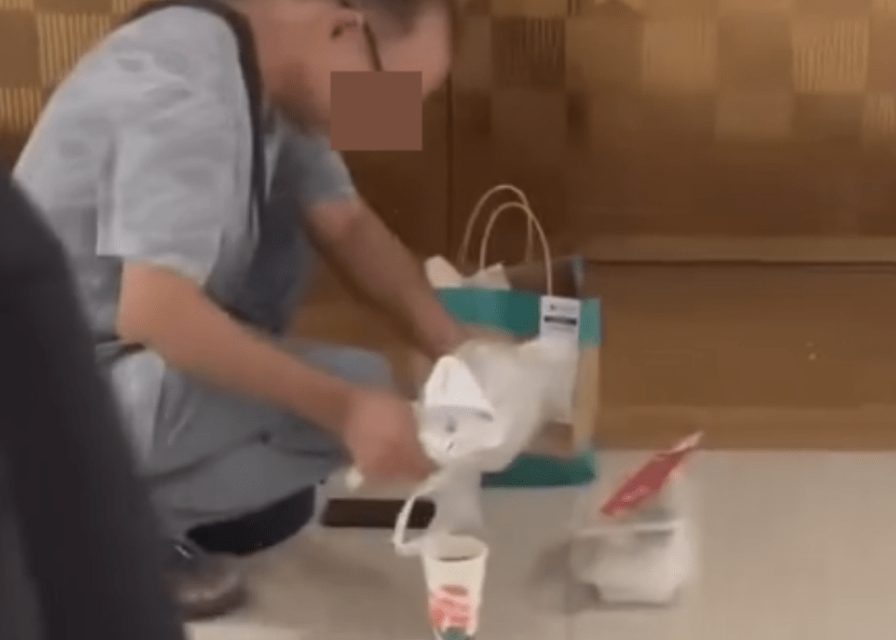 Food delivery rider spotted reusing spilled drink in TST shopping mall
