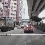 Near miss in Mong Kok as cyclist falls after van door opens unexpectedly