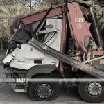 Crane truck hits bus stop on Sha Tau Kok Road, driver arrested after tyre blowout