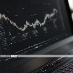 Hang Seng Index holds steady as chip stocks surge, Vanke faces pressure