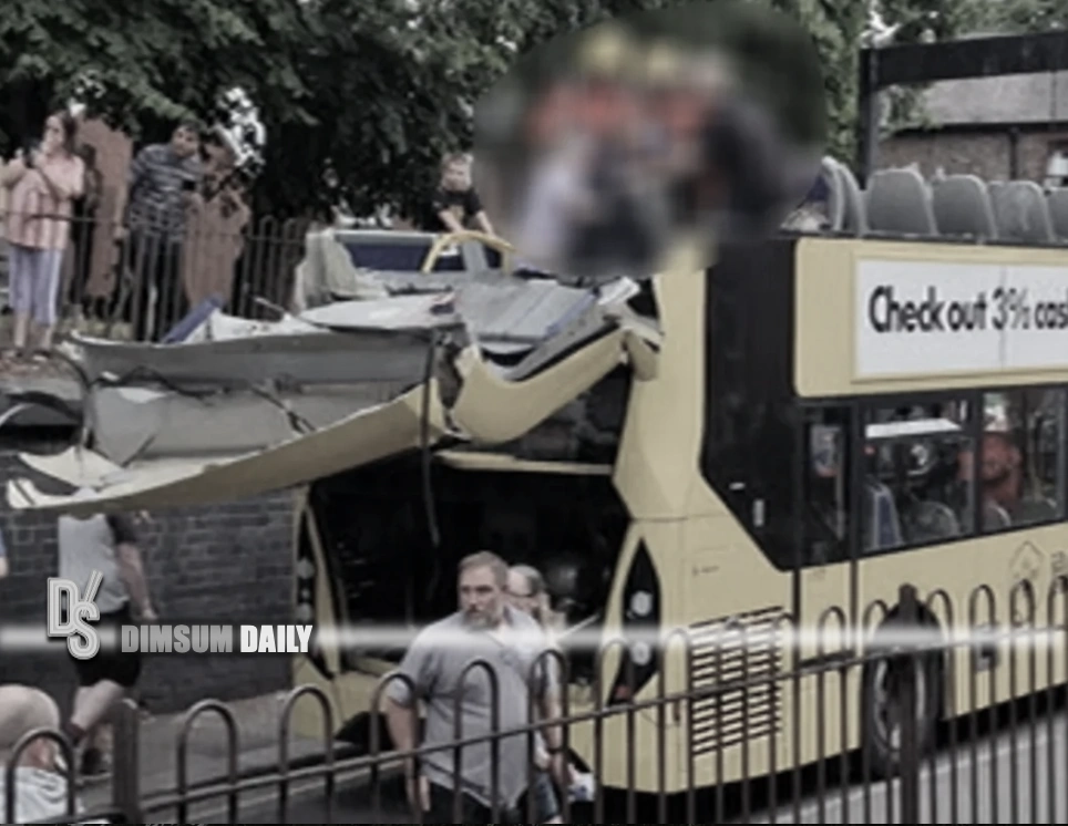 Double-decker bus crash in Salford, U.K. injures 20 as roof torn off by ...