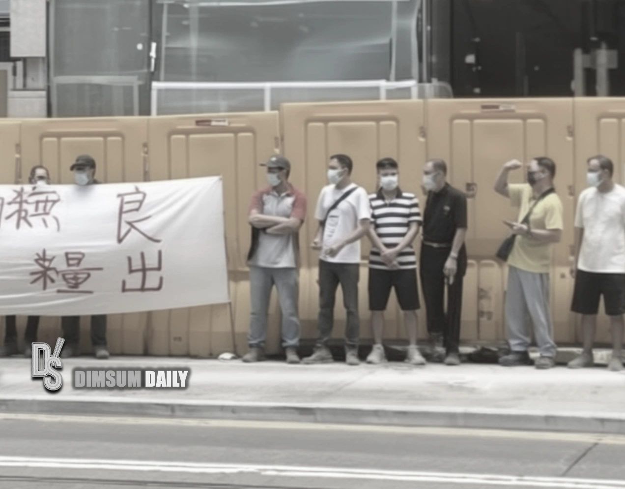 Central construction site workers protest over HK$5 million in unpaid wages