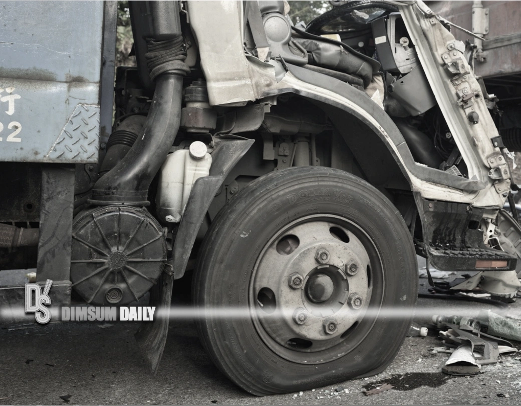 Driver trapped after lorry rams stationary container truck