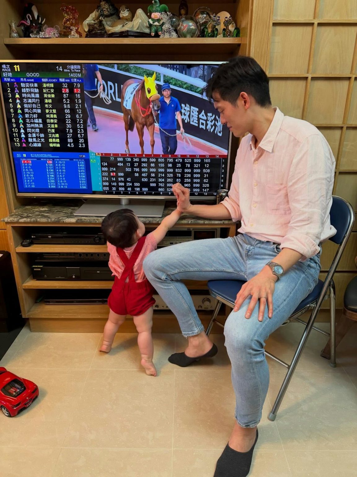 Former Miss Hong Kong Louisa Mak's baby son stares at horse racing ...
