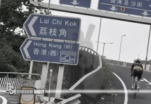 Cyclist rides on Ching Cheung Road near Cheung Sha Wan despite bicycle ban
