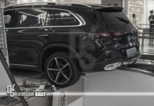 Mercedes‑Benz display car rolls back at Handan mall in Hebei and hangs over escalator with no injuries