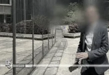 Education figure flees questions outside court doors