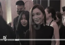 Janice Man turns heads in deep backless black gown