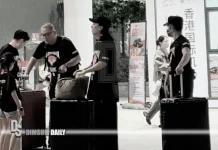 Aaron Kwok quietly returns to Hong Kong after Shenzhen concert as he pushes his own luggage at the border
