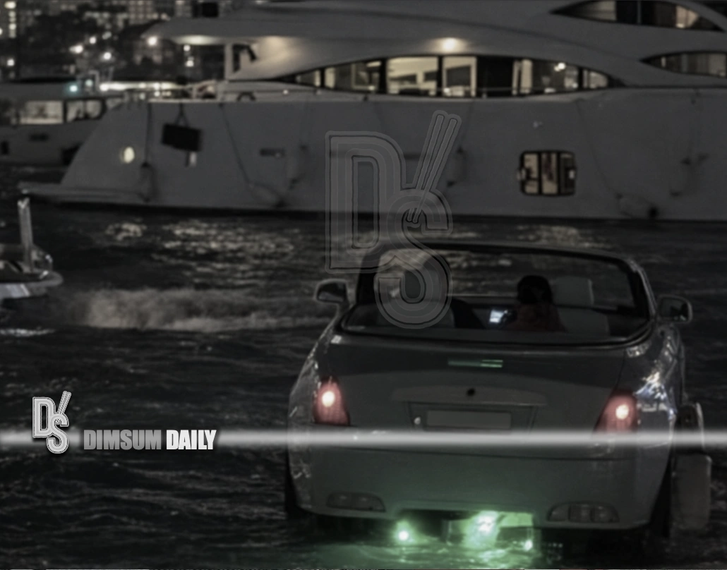 Convertible‑style speedboat weaves through Victoria Harbour on National Day night