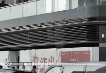 Kennedy Bay residential project sees wage dispute as construction workers stage protest in Kennedy Town
