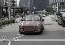 Mini Cooper in Kai Tak attempts wrong‑way dash across zebra crossing before police stop it