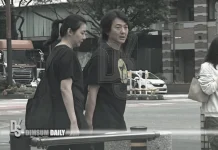 Yoyo Mung and Ekin Cheng hold hands in Fukuoka