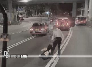 Evening‑gown woman jumps from taxi in Wan Chai and sits on road